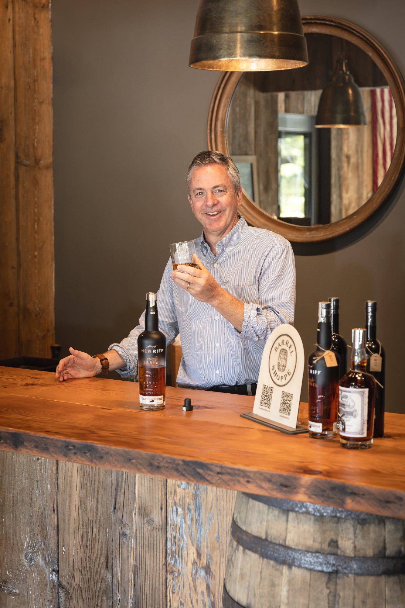 Matt Hagel founder of Barrel Shoppe pouring for a customer